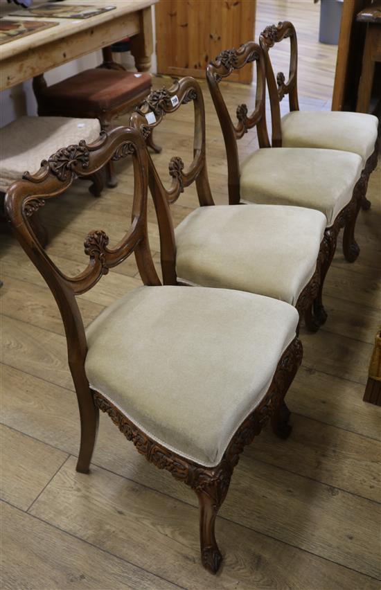 A set of four William IV colonial carved rosewood salon chairs